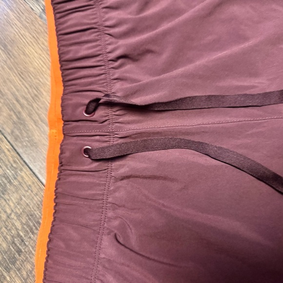 Saucony Women's Athletic Shorts in Maroon and Orange - Picture 3 of 6